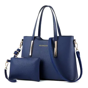 Set borsa a mano blu scuro in finta pelle con borsa shopper e custodia abbinata
