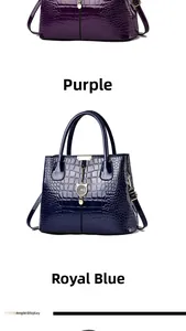 Detail view of purple and royal blue faux crocodile leather handbags with metal pendants