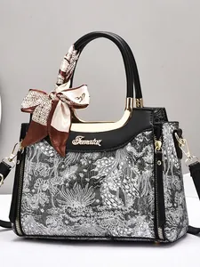 Elegant vintage handbag with floral embroidery and silk scarf handle for women