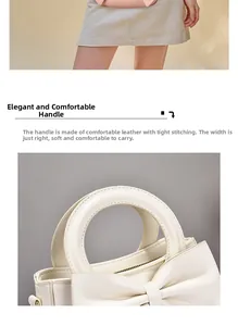Detalle del lazo elegante y costuras reforzadas en el bolso de mano de cuero sintético