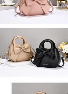 Detailed view of elegant handbags with bow decoration in pink, beige, and black colors