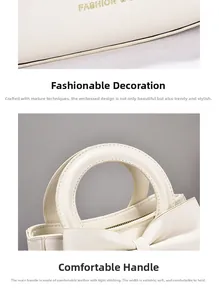 Detalle de elegante bolso de cuero crema con relieve de moda y decoración de lazo