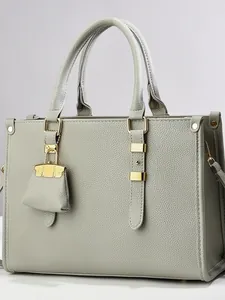 Elegant light grey lychee texture tote bag with gold hardware and padlock charm detail