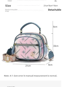 Detailed view of women's printed crossbody bag with dimensions 21x8x18cm and wide strap