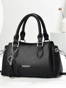 Black lychee texture leather tote bag for women with silver hardware and star charm