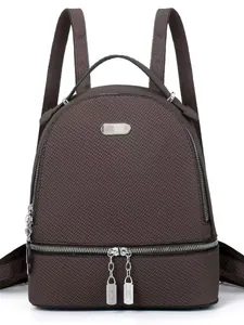 Deep coffee large-capacity mommy backpack with textured finish and silver metal plaque