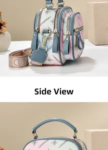 Side view of multi-layer gradient floral print bag with wide strap and gold hardware