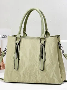 Borsa a mano a pieghe verde menta con dettagli in argento e tracolla staccabile donna