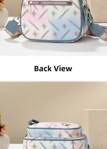 Detailed back view of pink blue gradient floral handbag with wide fabric shoulder strap