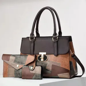 Three-piece set of vintage color-block patchwork tote bags with a gold circular metal lock