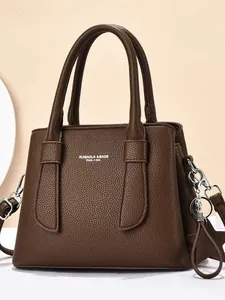 Dark brown pebble leather handbag for women featuring multi-compartment large capacity