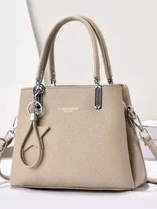 Khaki pebbled leather shoulder bag with top handles, star pendant and logo detail