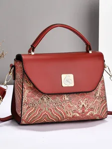 Sac à main rétro bicolore en cuir rouge et broderies élégantes pour femmes