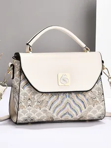 Sac à main jacquard bicolore pour femme avec motifs orientaux et fermoir doré