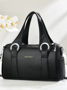 Large black leather Boston shoulder bag with soft texture and metallic ring hardware
