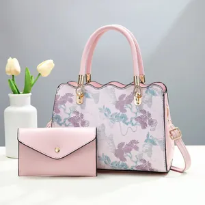 Pink floral embroidery handbag and matching coin purse set with elegant gold hardware