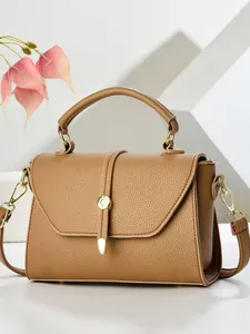 Minimalist camel crossbody square bag with lychee texture and gold metal buckle detail