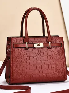 Deep red crocodile texture tote bag with gold buckle for women, versatile top handle design