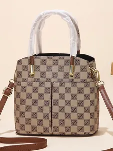 Chic brown checkerboard bucket bag with large capacity and stylish crossbody strap