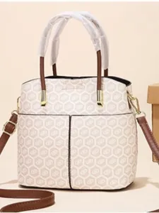 Women stylish cream bucket bag with brown hexagonal pattern and top handles
