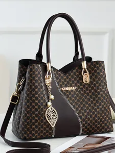 Brown monogram tote bag with large capacity and stylish leaf pendant for women