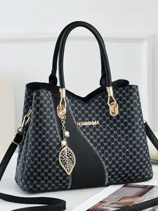 Black casual faux leather handbag with DH pattern and elegant gold leaf pendant
