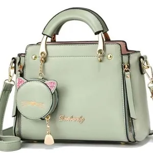 Chic pale green tote bag for women with cat-shaped coin purse and gold hardware