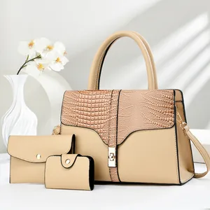 Detailed set of three beige tote bags including handbag, pouch and card holder with gold lock