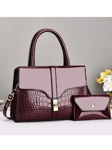 Deep wine red glossy patent leather handbag set with crocodile pattern and gold hardware