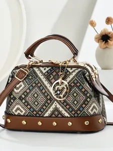 Retro geometric jacquard pillow bag with brown leather handles and heart charm accessory