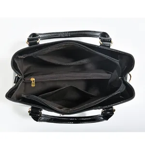 Detail view of large tote interior with zipper divider and coffee brown fabric lining