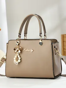 Chic khaki Saffiano leather tote bag with pearl bow charm and adjustable shoulder strap