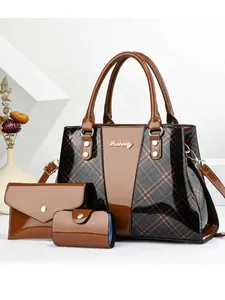 Three-piece retro brown patent leather tote bag set with grid stitching and gold logo
