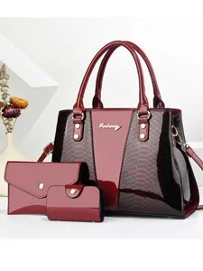Three-piece women's handbag set in deep wine red glossy snake skin textured leather