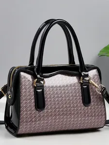 Purple glitter Boston handbag with black patent leather trim and gold hardware details