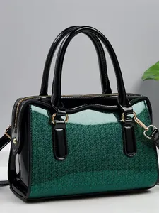 Glossy green sequin Boston handbag with black patent leather straps and gold hardware