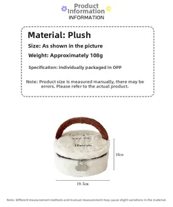Detail view of plush makeup bag with dimensions 19.5cm diameter and 10cm height