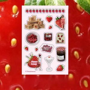 Detailed view of creative strawberry themed stickers for scrapbooking and DIY card making