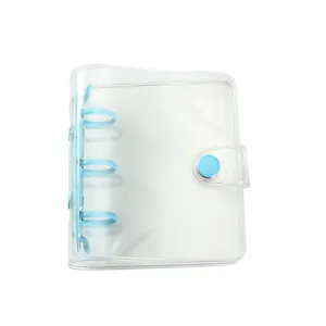 Mini transparent PVC 3-ring binder with glitter finish and blue snap closure mechanism