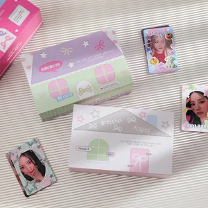 Detailed view of pastel storage boxes with magnetic closure and star-themed photocards