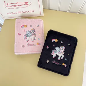 Plush A5 binder album with unicorn embroidery in pink and black furry covers