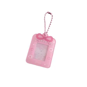 Pink bow acrylic card holder with love lasts print and cute cartoon character