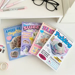 Flat lay of colorful spiral weekly planners with retro animal and dessert illustrations