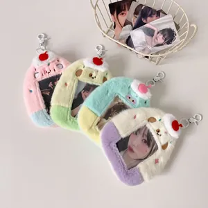 Detailed view of plush photocard holders in various pastel colors with cherry decorations
