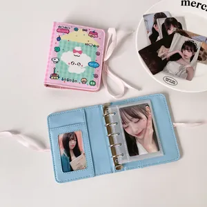 Mini album photo dessin animé avec fermeture ruban et pochettes transparentes en PVC