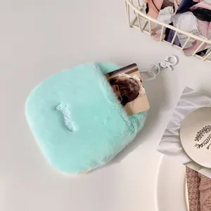 Detail of mint green plush photocard holder with so cute embroidery and lobster clasp