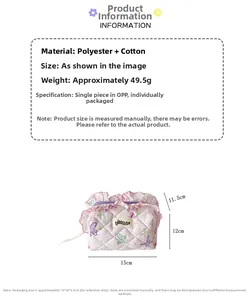Detailed view of quilted cotton pouch with floral pattern and ruffled purple edges