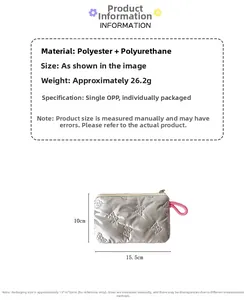 Detail of silver embossed bow pouch with pink ribbon zipper and premium PU texture