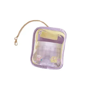 Transparent purple plush doll storage bag with cute cartoon motifs and gold chain strap