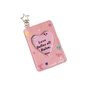Pink denim card holder with heart window and star keychain in Y2K aesthetic style